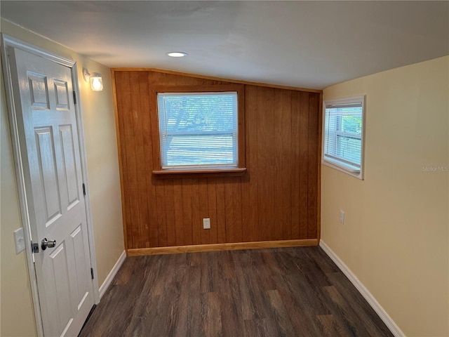 3762 18th Ter S, Saint Petersburg, FL 33711 - spare room featuring dark wood finished floors, baseboards, and vaulted ceiling