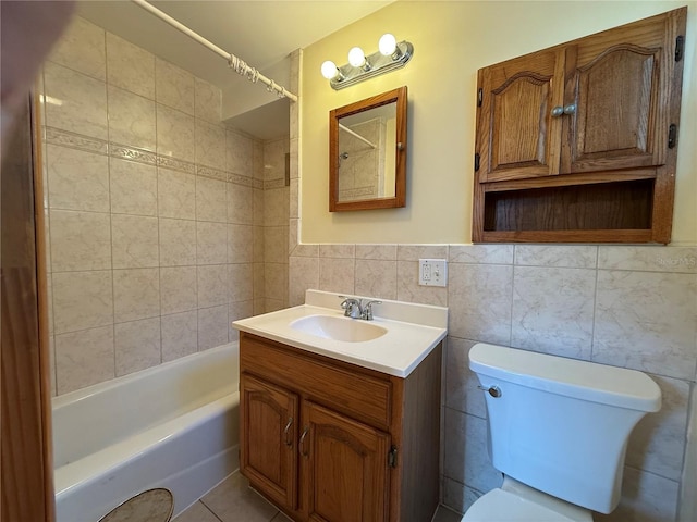 3762 18th Ter S, Saint Petersburg, FL 33711 - bathroom with toilet, tile walls, bathing tub / shower combination, and vanity