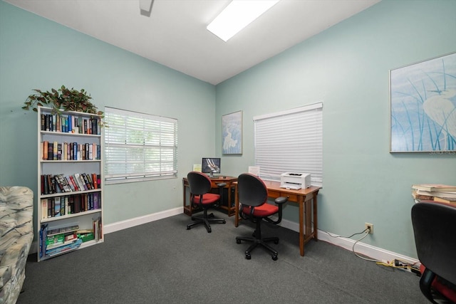 home office with carpet, baseboards, and vaulted ceiling