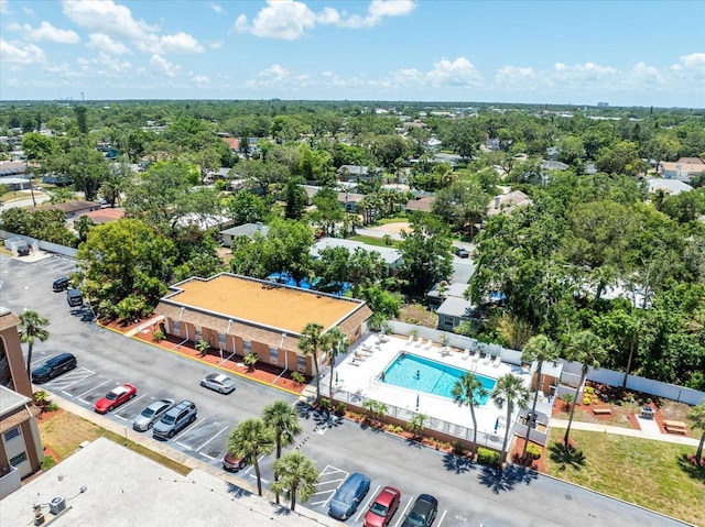 drone / aerial view of a pool