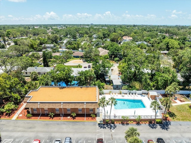 drone / aerial view of a pool
