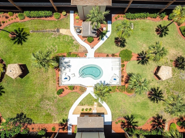 drone / aerial view of a pool