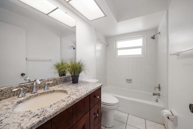 1142 Lancer Ln, Tarpon Springs, FL 34689 - bathroom with vanity, toilet, washtub / shower combination, and tile patterned floors