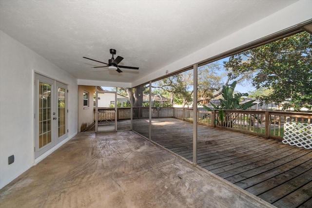 1142 Lancer Ln, Tarpon Springs, FL 34689 - deck with french doors and ceiling fan