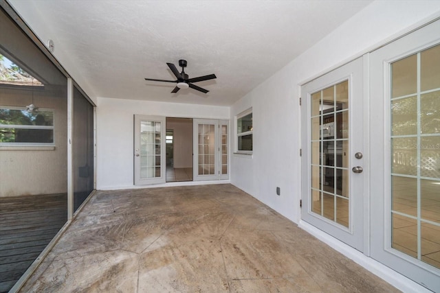1142 Lancer Ln, Tarpon Springs, FL 34689 - unfurnished sunroom featuring french doors
