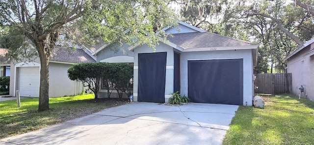 15124 Deer Meadow Dr, Lutz, FL 33559 - garage with concrete driveway