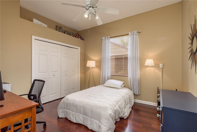 800 Belted Kingfisher Dr S, Palm Harbor, FL 34683 - bedroom featuring a closet, dark wood-type flooring, an office area, baseboards, and a ceiling fan