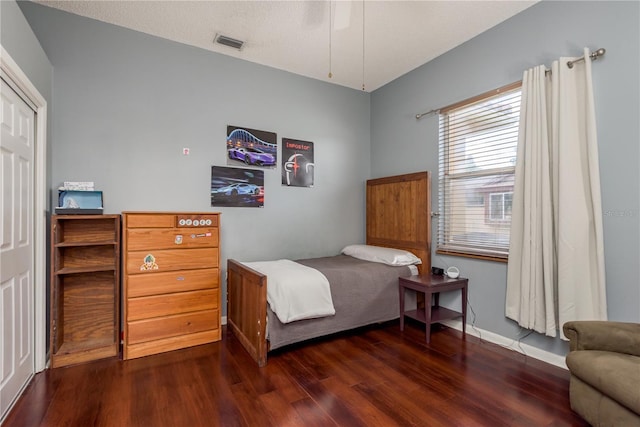 800 Belted Kingfisher Dr S, Palm Harbor, FL 34683 - bedroom featuring wood finished floors and baseboards