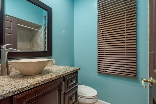 800 Belted Kingfisher Dr S, Palm Harbor, FL 34683 - bathroom featuring vanity, toilet, and a shower