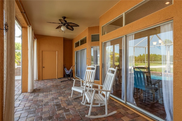 800 Belted Kingfisher Dr S, Palm Harbor, FL 34683 - sunroom with a textured wall