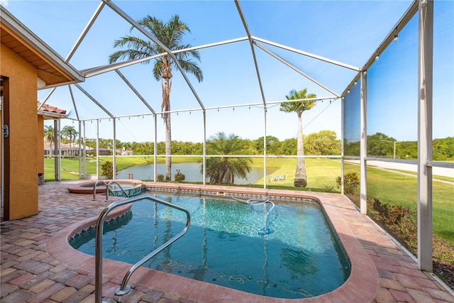 800 Belted Kingfisher Dr S, Palm Harbor, FL 34683 - outdoor pool featuring a lanai, a patio, a water view, and a lawn