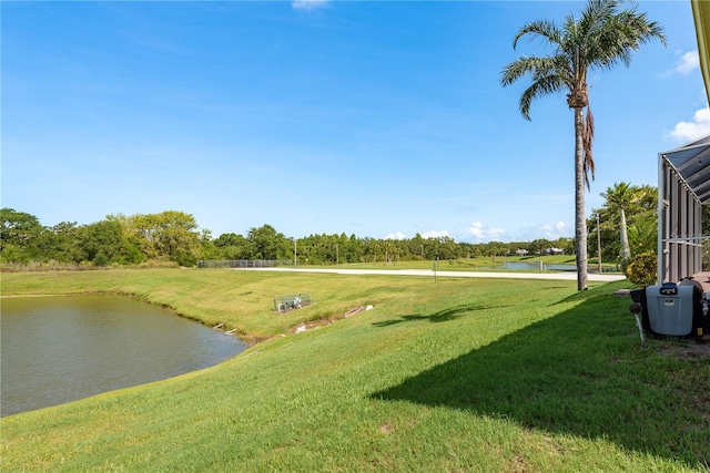 800 Belted Kingfisher Dr S, Palm Harbor, FL 34683 - view of property's community with a water view and a yard
