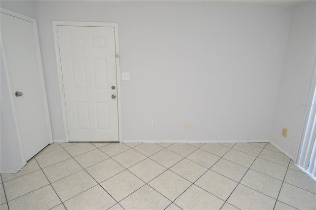 1400 Gandy Blvd N Unit 1705, Saint Petersburg, FL 33702 - unfurnished room with light tile patterned floors and baseboards