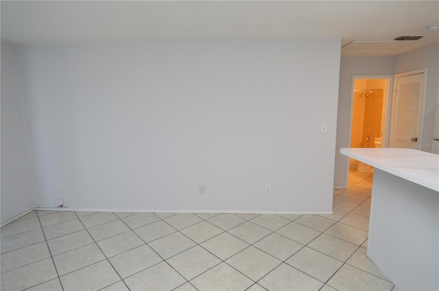 1400 Gandy Blvd N Unit 1705, Saint Petersburg, FL 33702 - unfurnished room with baseboards and light tile patterned flooring