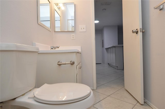 1400 Gandy Blvd N Unit 1705, Saint Petersburg, FL 33702 - bathroom featuring tile patterned floors, vanity, and baseboards