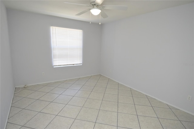 1400 Gandy Blvd N Unit 1705, Saint Petersburg, FL 33702 - empty room featuring ceiling fan, baseboards, and light tile patterned floors