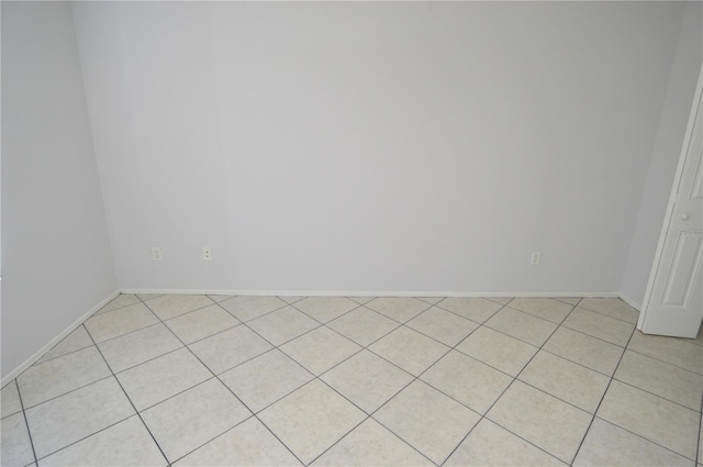 1400 Gandy Blvd N Unit 1705, Saint Petersburg, FL 33702 - spare room with light tile patterned floors and baseboards
