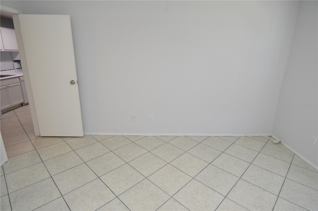 1400 Gandy Blvd N Unit 1705, Saint Petersburg, FL 33702 - spare room with light tile patterned floors and baseboards
