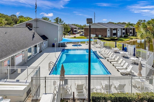 1400 Gandy Blvd N Unit 1705, Saint Petersburg, FL 33702 - community pool featuring a patio and a residential view