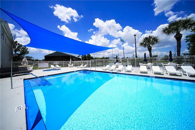 1400 Gandy Blvd N Unit 1705, Saint Petersburg, FL 33702 - community pool with a patio and a community hot tub