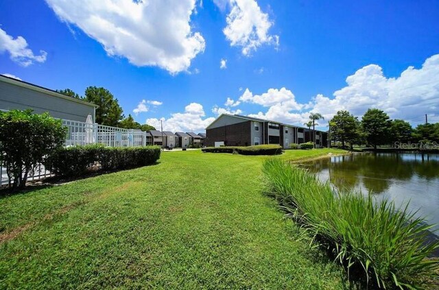 1400 Gandy Blvd N Unit 1705, Saint Petersburg, FL 33702 - view of green lawn featuring a water view