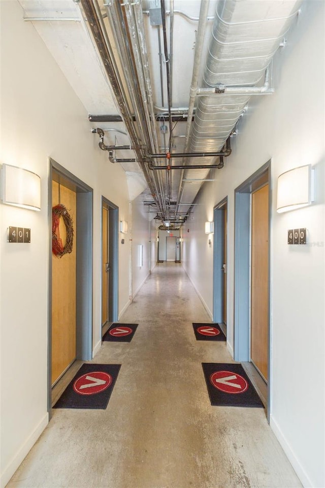 101 N 12th St Unit 400, Tampa, FL 33602 - hallway with concrete flooring and baseboards