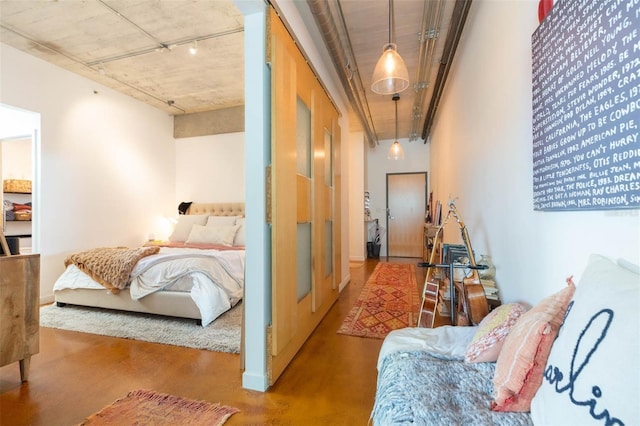 101 N 12th St Unit 400, Tampa, FL 33602 - bedroom featuring concrete flooring