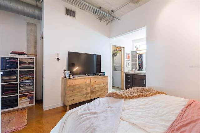 101 N 12th St Unit 400, Tampa, FL 33602 - bedroom with a walk in closet, concrete flooring, and a closet