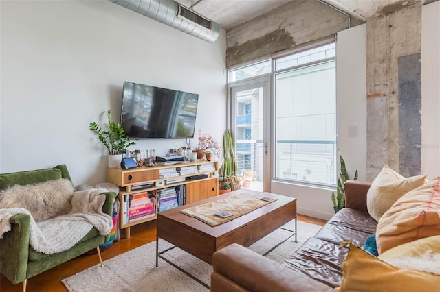 101 N 12th St Unit 400, Tampa, FL 33602 - living area featuring a towering ceiling and wood finished floors