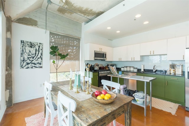 101 N 12th St Unit 400, Tampa, FL 33602 - dining area with concrete flooring, recessed lighting, and baseboards