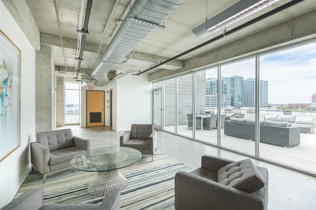 101 N 12th St Unit 400, Tampa, FL 33602 - living room featuring a view of city and baseboards