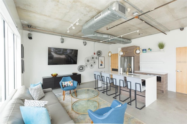 101 N 12th St Unit 400, Tampa, FL 33602 - living area featuring finished concrete flooring