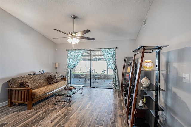6118 Becklin Pl, Riverview, FL 33578 - living room with wood finished floors, a ceiling fan, a textured ceiling, and baseboards