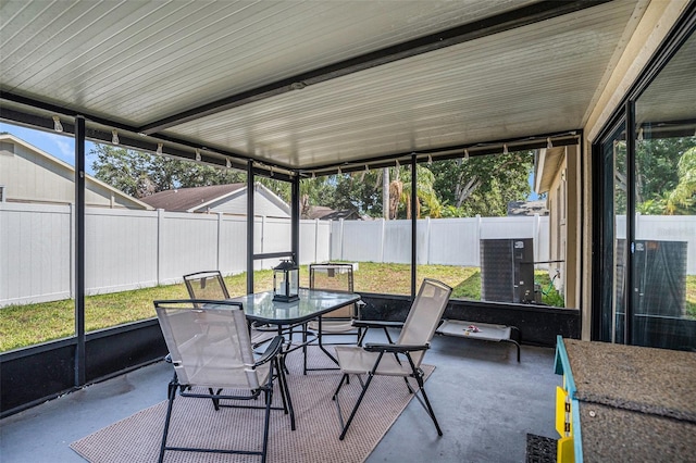 6118 Becklin Pl, Riverview, FL 33578 - sunroom / solarium with outdoor dining area