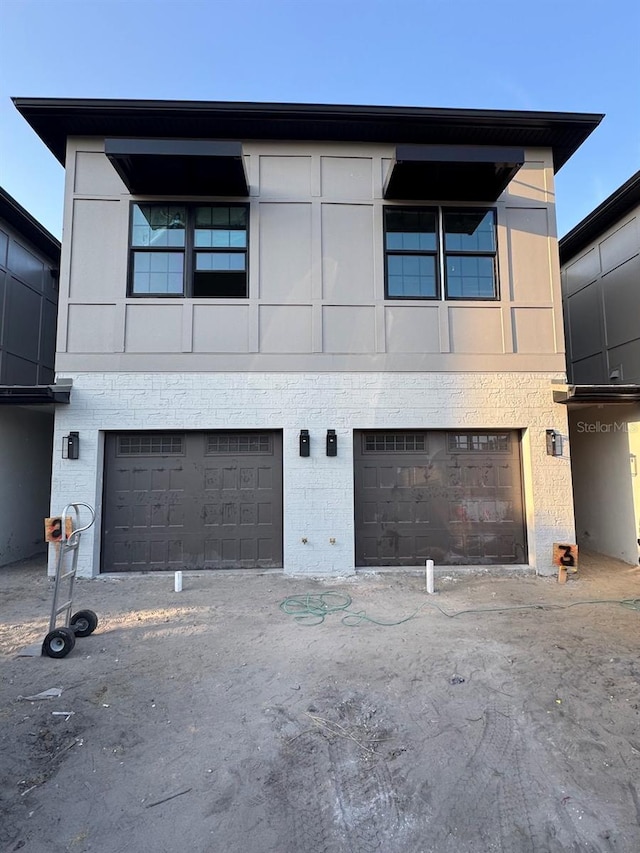 4308 W Gray St Unit 1Thru 6, Tampa, FL 33609 - view of front of home with a garage