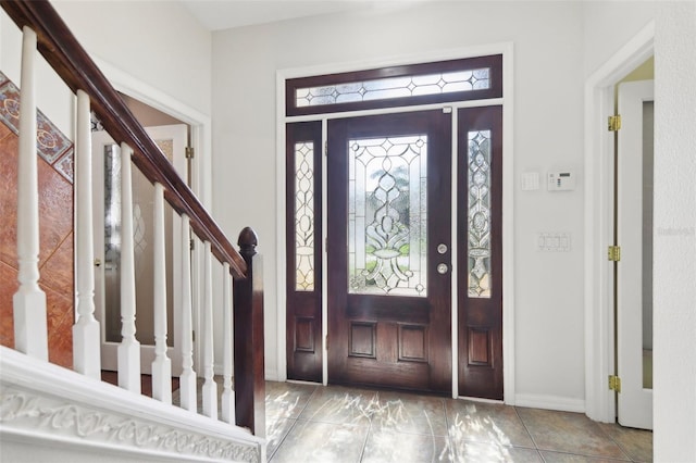 11029 Lynn Lake Cir, Tampa, FL 33625 - entrance foyer featuring stairway and baseboards