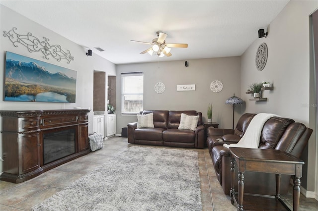 11029 Lynn Lake Cir, Tampa, FL 33625 - living room featuring a ceiling fan and light tile patterned flooring
