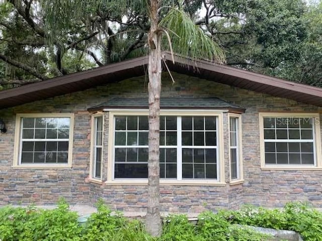 17220 Estes Rd, Lutz, FL 33548 - view of property exterior featuring stone siding