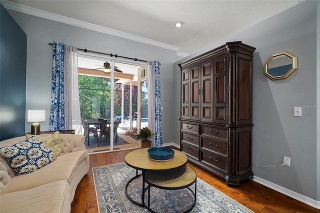 2903 Manor Ridge Pl, Valrico, FL 33596 - sitting room featuring baseboards, wood finished floors, crown molding, and ceiling fan