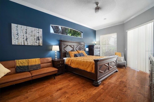 2903 Manor Ridge Pl, Valrico, FL 33596 - bedroom featuring wood-type flooring, crown molding, and a textured ceiling