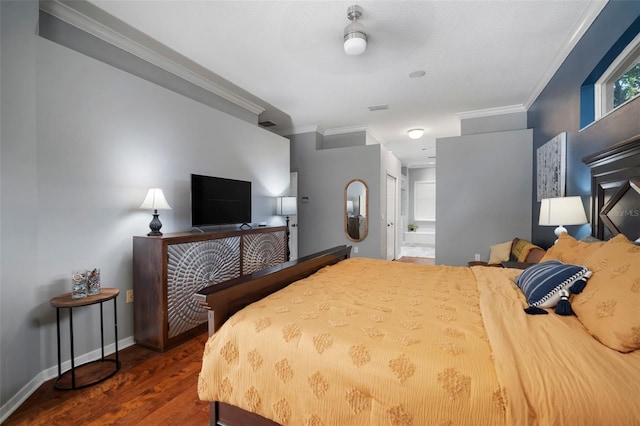 2903 Manor Ridge Pl, Valrico, FL 33596 - bedroom featuring ornamental molding, wood finished floors, baseboards, and connected bathroom