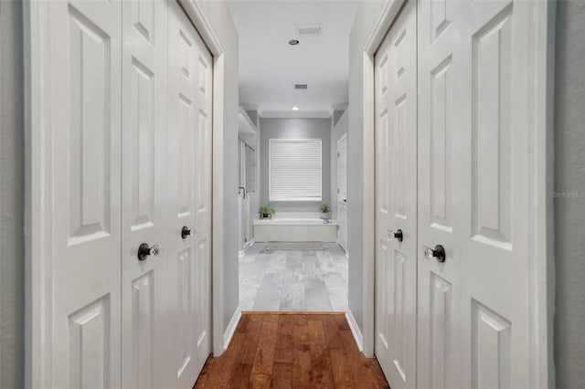 2903 Manor Ridge Pl, Valrico, FL 33596 - hall featuring crown molding, dark wood finished floors, and baseboards