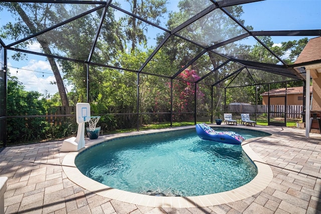 2903 Manor Ridge Pl, Valrico, FL 33596 - view of swimming pool featuring a patio, a fenced backyard, and glass enclosure