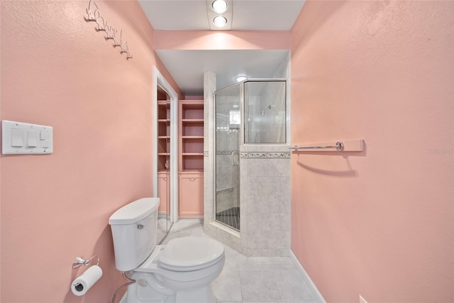 8011 N Mobley Rd, Odessa, FL 33556 - full bath with tile patterned floors, a stall shower, toilet, and baseboards