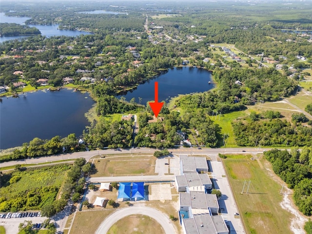 8011 N Mobley Rd, Odessa, FL 33556 - aerial view of property's location with a large body of water and a heavily wooded area