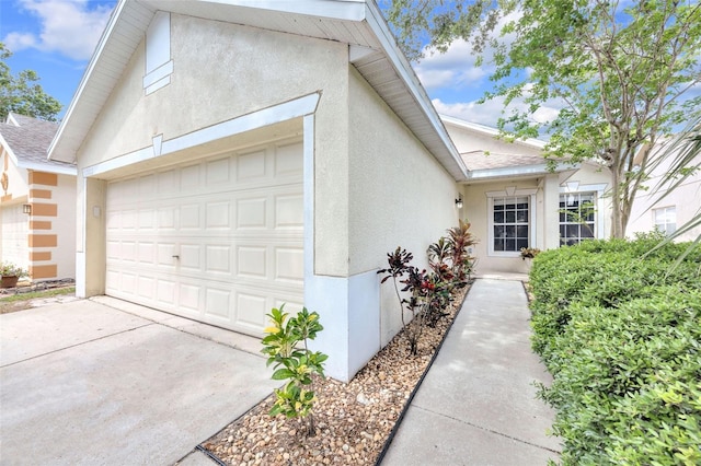 garage featuring driveway