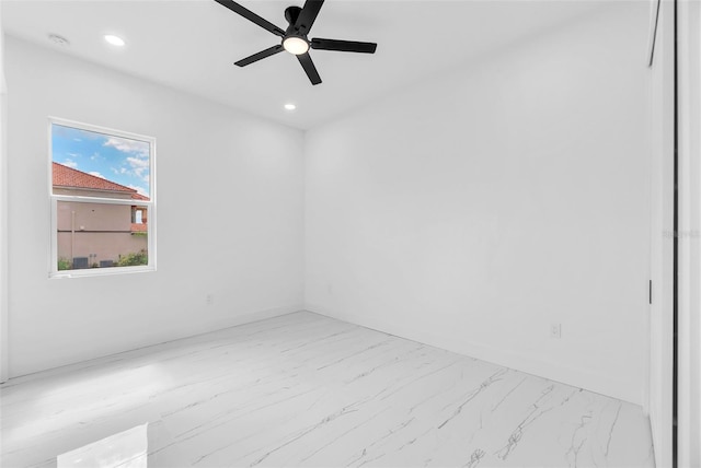 11921 Fort King Hwy, Thonotosassa, FL 33592 - spare room featuring marble finish flooring, a ceiling fan, recessed lighting, and baseboards