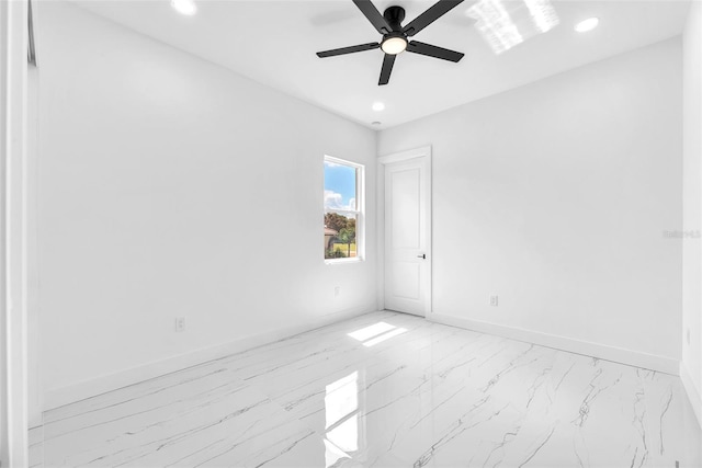 11921 Fort King Hwy, Thonotosassa, FL 33592 - spare room featuring a ceiling fan, light marble finish floors, recessed lighting, and baseboards