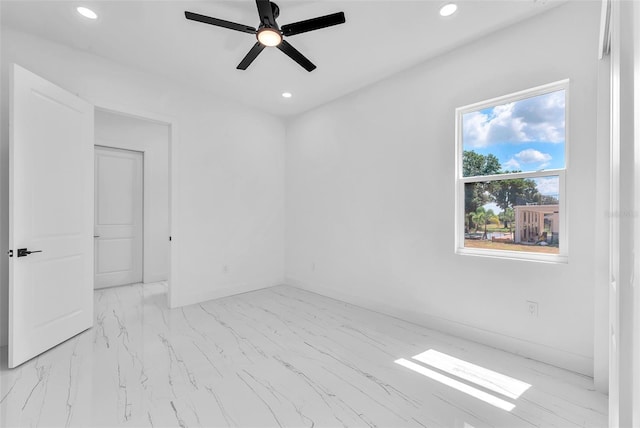 11921 Fort King Hwy, Thonotosassa, FL 33592 - spare room with recessed lighting, a ceiling fan, marble finish flooring, and baseboards