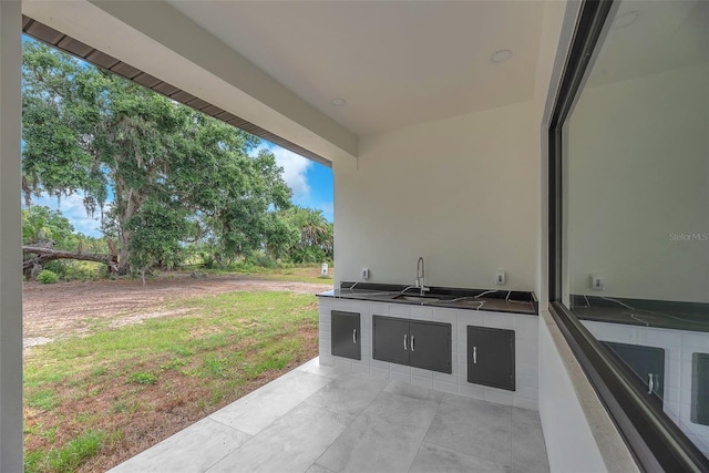 11921 Fort King Hwy, Thonotosassa, FL 33592 - view of patio featuring a sink and an outdoor kitchen